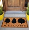Beautiful welcome doormat peach color with black tree Placed outside door