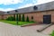 Beautiful well-kept courtyard of an old brick stable. Sviyazhsk. Russia