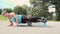 Beautiful well-trained woman is doing exercises with the fascia roll