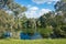 Beautiful Werribee river view with native gum tree Eucalyptus along the riverbank. Australian nature landscape of a waterway