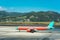 Beautiful white airplane on the runway in Dalaman airport