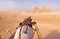 Beautiful White Arabic Horse Pulling Towards Giza Great Pyramids in Cairo Desert