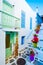 Beautiful white building`s courtyard view on the greek street