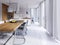 Beautiful white dining room with a large table and designer chairs