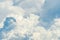 Beautiful white fluffy cloud abstract background. Cloudscape.  Fluffy white clouds on sunny day. Nature weather. Soft like cotton