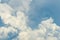 Beautiful white fluffy cloud abstract background. Cloudscape.  Fluffy white clouds on sunny day. Nature weather. Soft like cotton