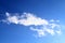 Beautiful white fluffy cloud formations on a blue sky taken in spring