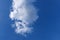 Beautiful white fluffy cloud under deep blue sky. Amazing clear sky day for background