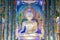 Beautiful white giant Buddha image inside the Buddhist church at Wat Rong Suea Ten Temple, also known as the Blue Temple, locate a