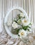 Beautiful white roses ,vintage frames and background of velvet