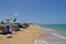 Beautiful white sand beach and ocean waves with clear blue sky