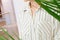 Beautiful white striped woman blouse shirt fashion details close up. minimal comfortable trendy fashion style.