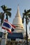 Beautiful White Stupa and Thailand Flag in Wat Pra Sri Mahatatu temple in bangkok Thailand
