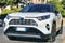 Beautiful white suv car model Toyota Rav4 Hybrid produced by Japanese Toyota Motor Corporation