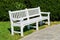 Beautiful white vintige bench in park