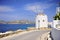 Beautiful white windmill in the street