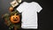 Beautiful White women\\\'s t-shirt Halloween mockup with a dark background pumpkins and delicate autumn leaves, AI generated