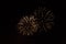 Beautiful white and yellow firework isolated closeup