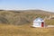 Beautiful white Yurts with pray flags and dray in Huanghuagou Huitengxile grassland near Hohhot, Inner Mongolia, China