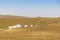 Beautiful white Yurts with pray flags and dray in Huanghuagou Huitengxile grassland near Hohhot, Inner Mongolia, China