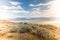 Beautiful wide angle landscape view of salt flats inside of Utahâ€™s Antelope Island State Park on Great Salt Lake