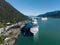 beautiful wide capture of alaskan port during the day showing mountain landscape