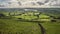 Beautiful wide vista landscape image of English countryside in Peak District National Park late afternoon early Autumn