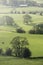 Beautiful wide vista landscape image of English countryside in Peak District National Park late afternoon early Autumn