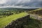 Beautiful wide vista landscape image of English countryside in Peak District National Park late afternoon early Autumn