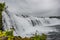 Beautiful, wide and wild Faxafoss waterfall in Eastern-South Iceland, near Reykjavik, summer time