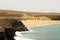 Beautiful wild beach with desert dunes and rocks, Playas de Papagayo, Lanzarote, Canary Islands