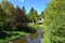 Beautiful Winding Stream and English Gardens on a Spring Day