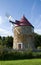 Beautiful Windmill with Old Wooden Fence in L\\\'Isle-aux-Coudres Quebec