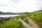 Beautiful wineries in the summer season of western Germany, visible road between rows of grapes.