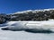 Beautiful winter atmosphere on storage lake Valos or reservoir lake Valos (Speichersee Valos)