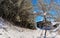 Beautiful Winter Landscape with Evergreen Coniferous Trees Covered in Snow on a Sunny Blue Sky Day