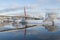 Beautiful winter landscape with footbridge and nice reflection in water of river