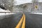 Beautiful winter landscape with highway road with turn and snow-covered trees.