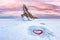 Beautiful winter landscape island Ogoy frozen lake Baikal blue ice with red hearth love sunset light