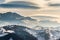 Beautiful winter landscape in the mountains with lenticular clouds and snow