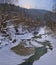 Beautiful winter landscape with a river in the Carpathians