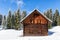 Beautiful Winter landscape with a small chalet