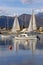 Beautiful winter Mediterranean landscape. Sailboats and fishing boats on water. Montenegro, Kotor Bay