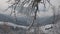 Beautiful winter in a mountain village. A view of the houses among the mountains in winter