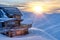 Beautiful winter panorama with wooden mountain cabin.