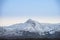 Beautiful Winter sunrise landscape image of Mount Snowdon and ot