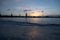 A beautiful winter sunrise landscape in Latvia capital Riga with frozen river Daugava.
