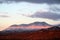 Beautiful winter sunset with snow covered Santa Catalina Pusch Ridge mountains in Tucson, Arizona