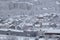 Beautiful winter view of houses and buildings with roofs covered with heavy snow. In snowy season, roof with lot snow.