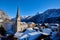 Beautiful winterlandscape of Hallstatt mountain village with Hallstatter lake in Austrian Alps